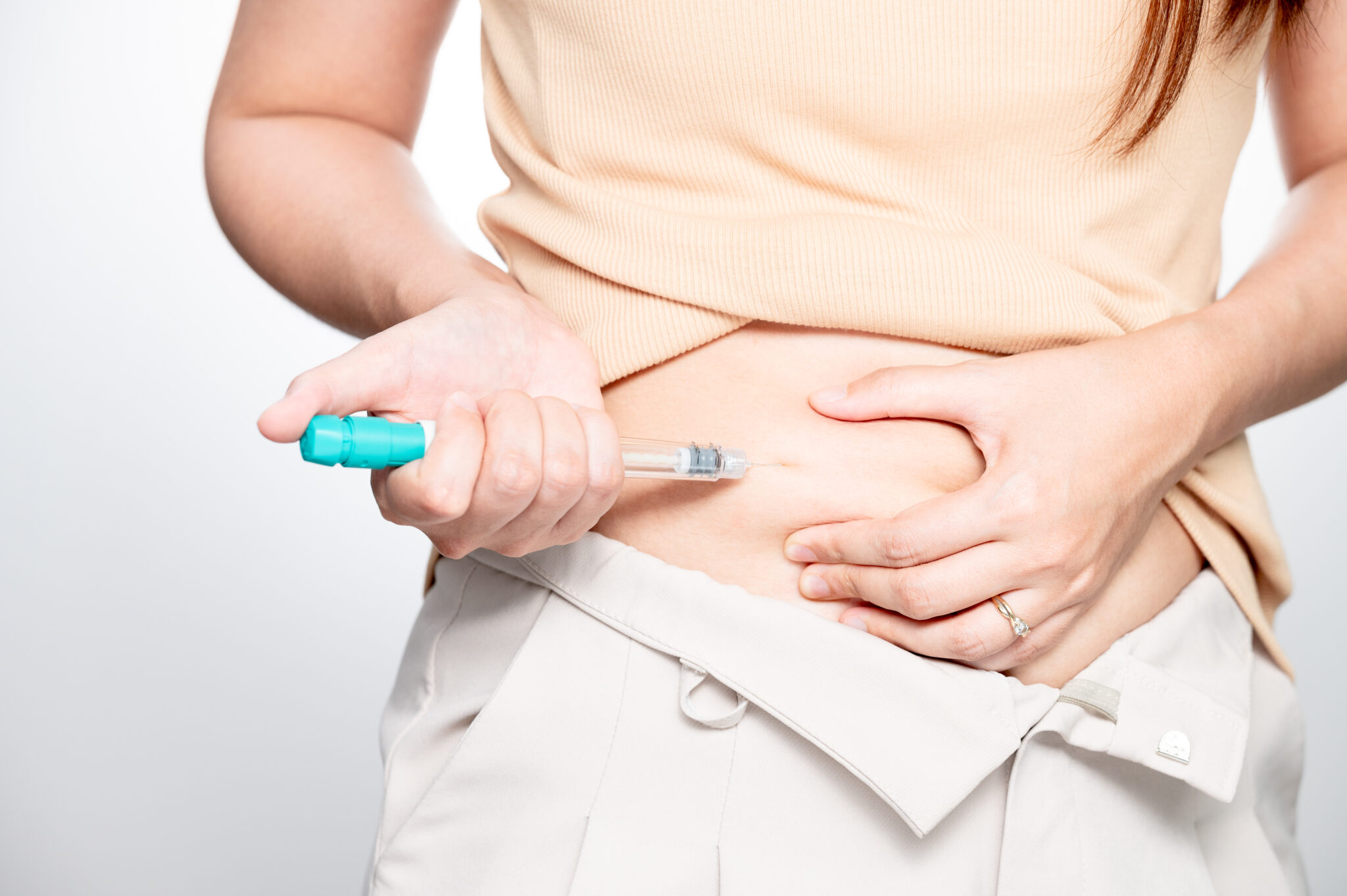 Woman Injecting Herself With A Semaglutide Injection